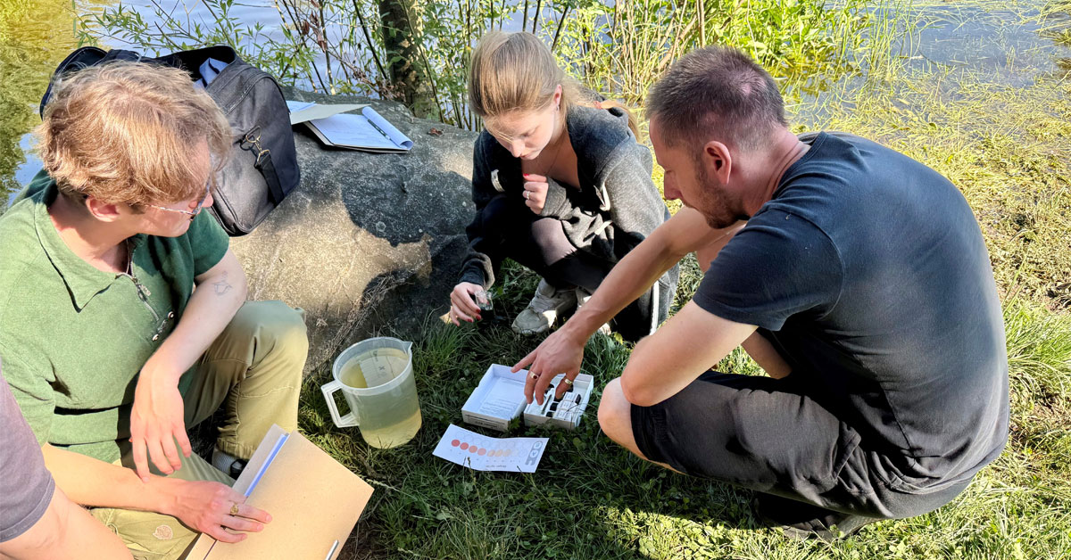 Research students testing groundwater in the field