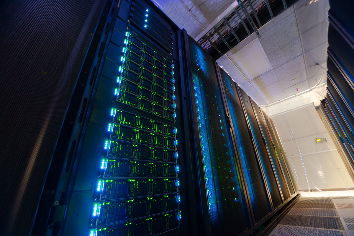 Racks of servers that make up the Expanse supercomputer