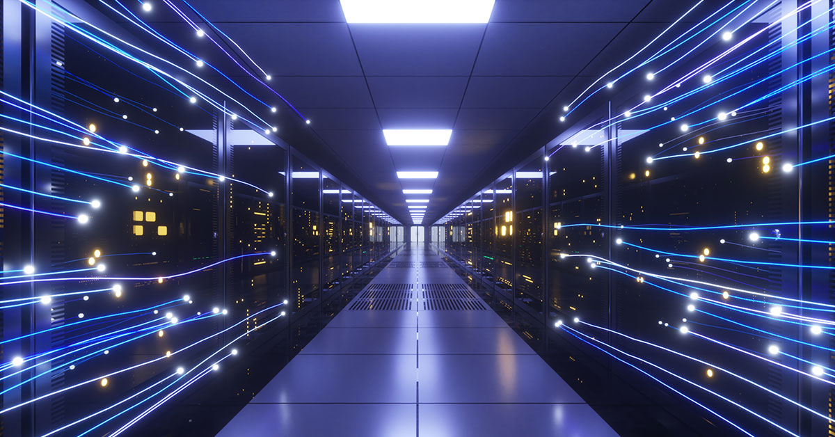 A glowing, high-tech server room aisle with blue fiber-optic light trails streaming past dark data center server racks.